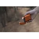 Latarka Olight Baton 4 Premium Edition z bezprzewodowym etui ładującym Pomarańczowa - 1300 lumenów
