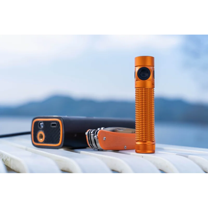 Latarka Olight Baton 4 Pro Pomarańczowa - 1600 lumenów