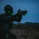 Latarka taktyczna z celownikiem laserowym Olight BALDR Pro R - 1350 lumenów, zielony laser
